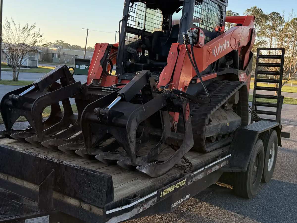 Grapple: loaded on the delivery trailer