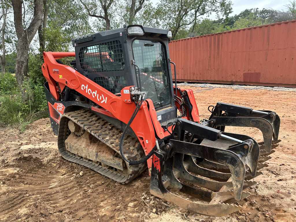 Red Kubota SVL75-3 with grapple